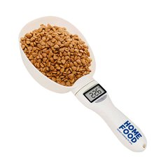Electronic measuring spoon for feed dosing